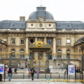 Entrance to the Palais de Justice. The front gate still carries the emblems of royalty.